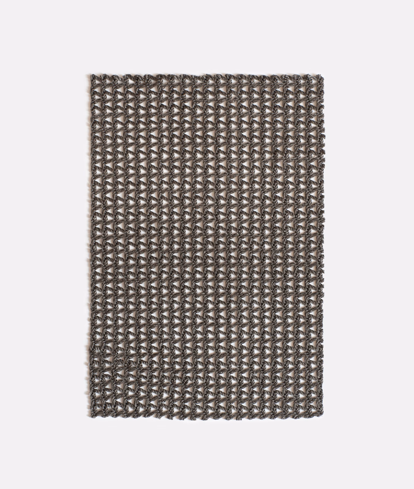 Dense taupe-grey weave with repeating miniature chevrons and contrasting flecked threads