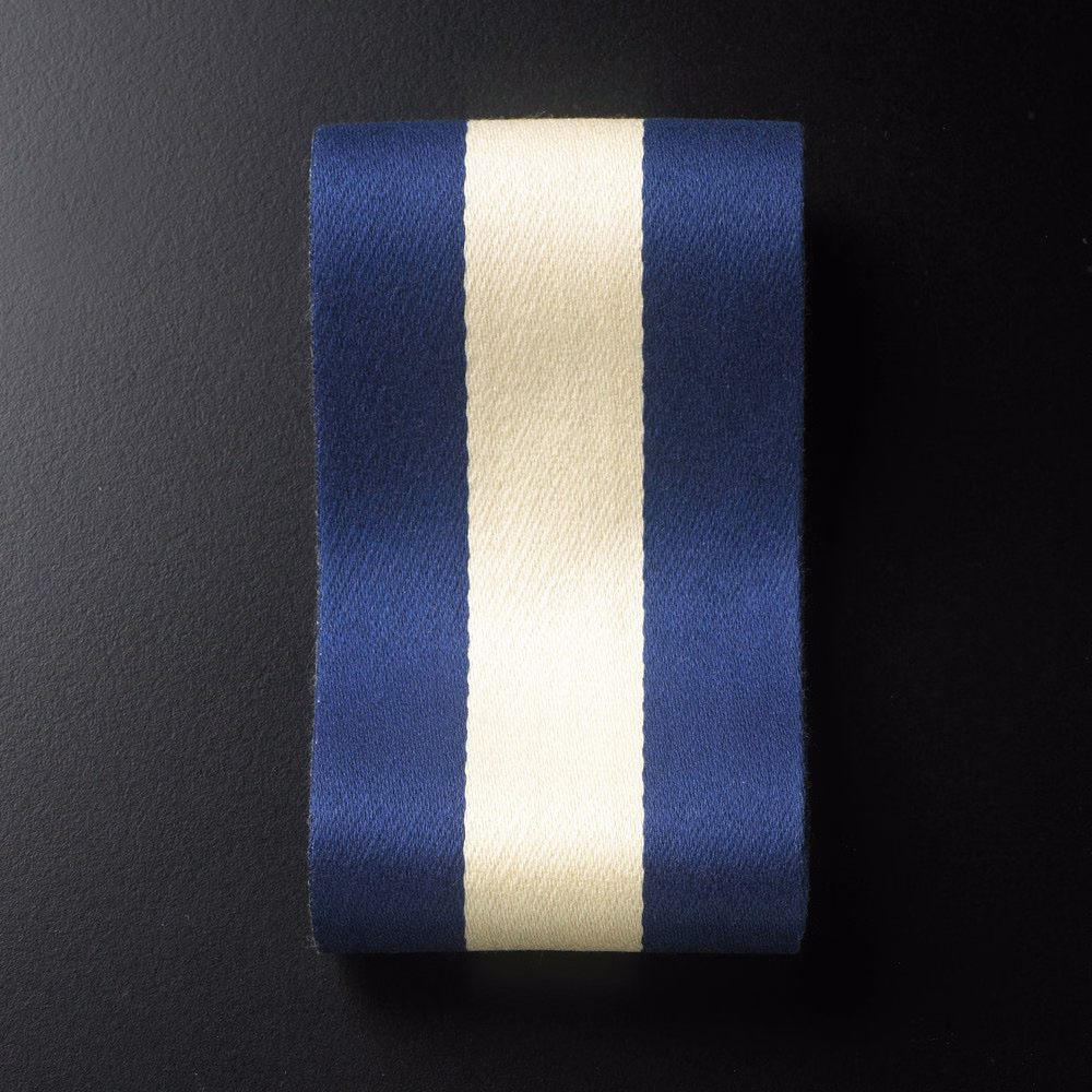 Deep navy fabric with broad ivory vertical stripe and subtle woven grain