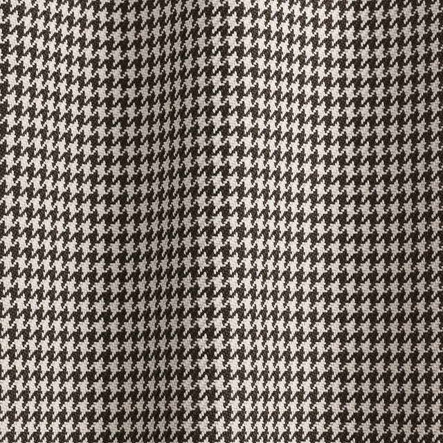 Charcoal and ivory small houndstooth weave with a dense, tactile texture
