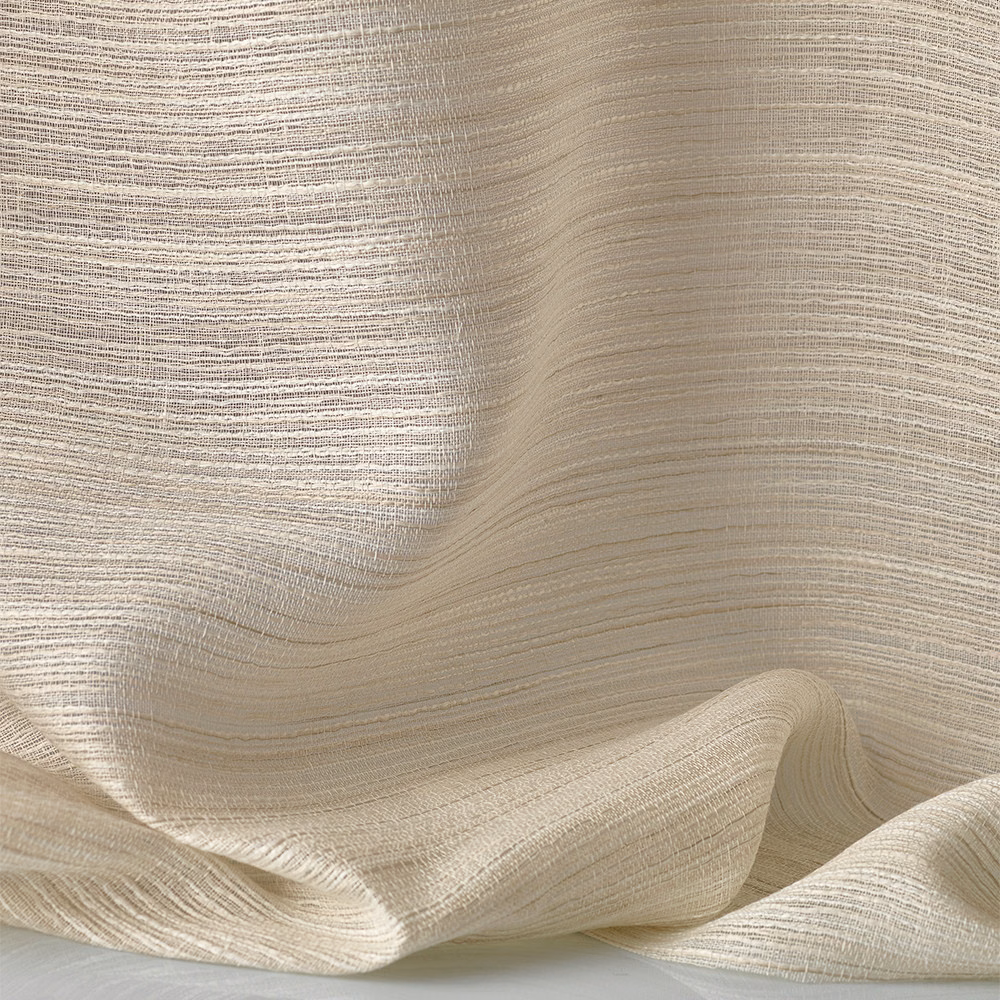 Warm ivory fabric with fine horizontal ripples folding into soft waves
