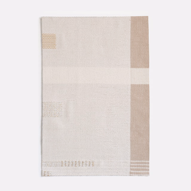 Pale ivory jacquard with taupe vertical band and subtle woven geometric marks