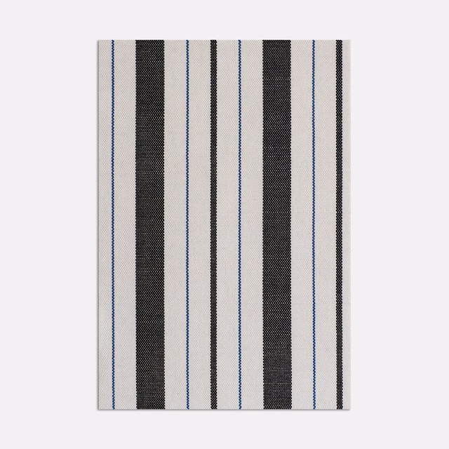 Cream, charcoal and blue vertical stripes in a finely textured woven surface