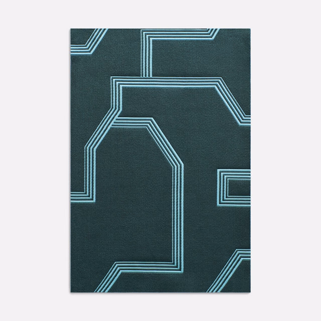 Deep pine teal jacquard with pale blue angular geometric outlines and fine woven grain