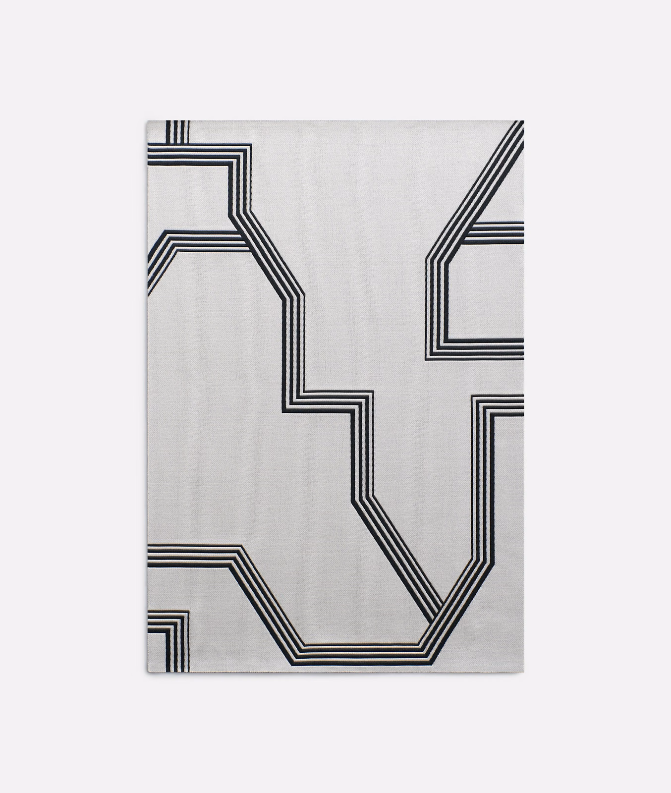 Pale grey jacquard with bold black stepped geometric lines and subtle woven texture