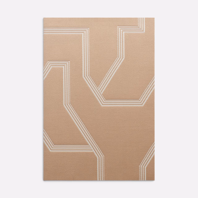 Camel-beige jacquard with ivory stepped geometric lines and a softly textured ground