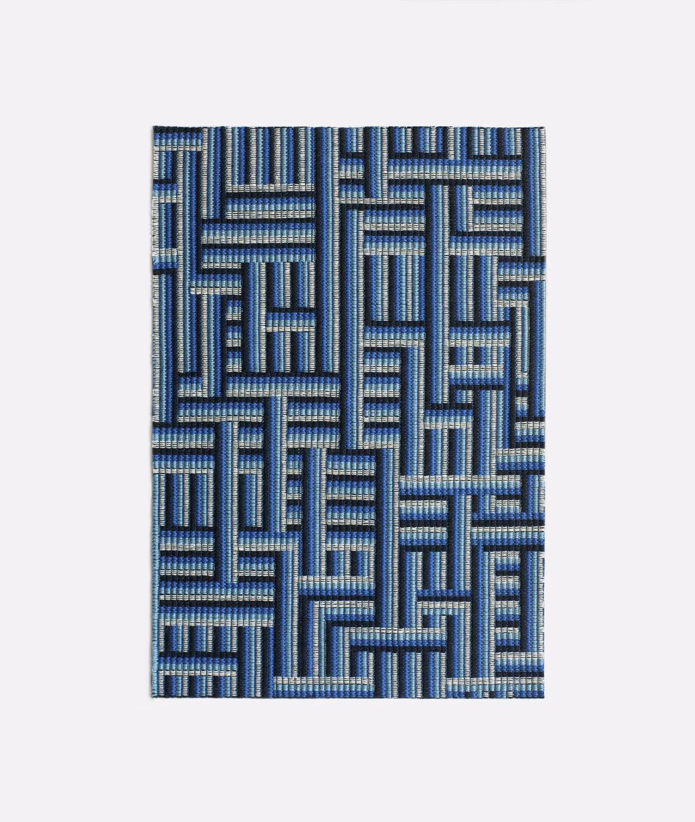 Cool blue and grey jacquard with interlocking maze-like geometric blocks