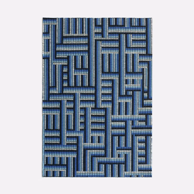 Cool blue and grey jacquard with interlocking maze-like geometric blocks