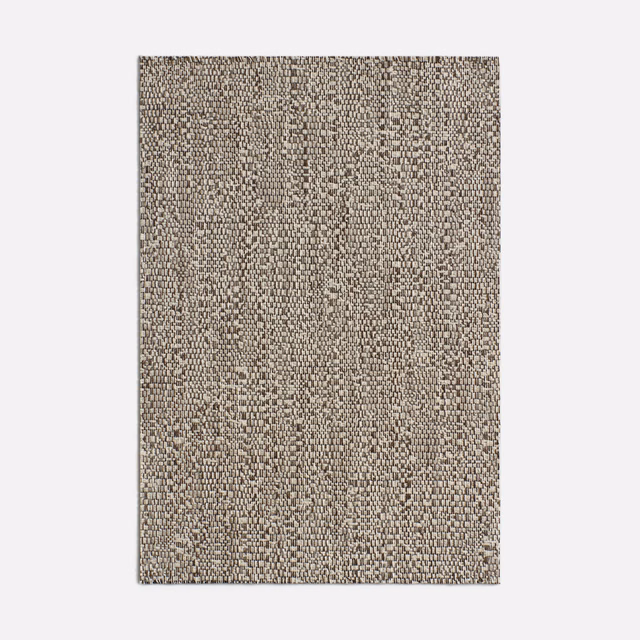 Taupe Betulla jacquard with tiny dark flecks and a tactile, pebble-like weave