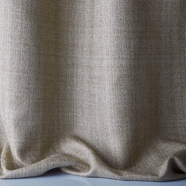 Warm greige-gold textile with fine vertical texture and softly reflective folds