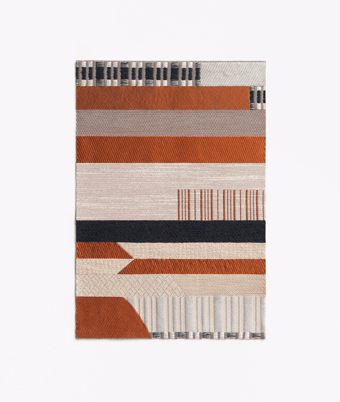 Rust, cream and charcoal jacquard with horizontal bands and geometric woven motifs