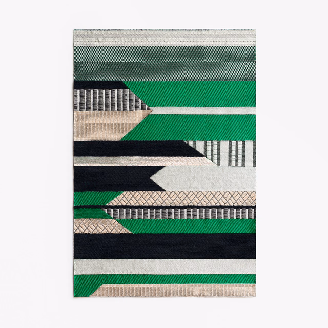 Emerald green jacquard swatch with black, ivory and taupe geometric bands