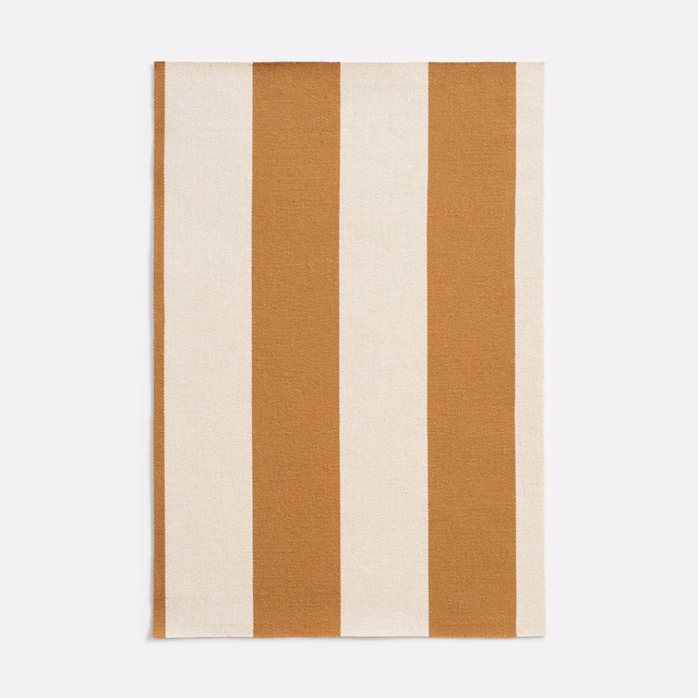 Warm amber and ivory vertical stripes with a fine woven jacquard texture