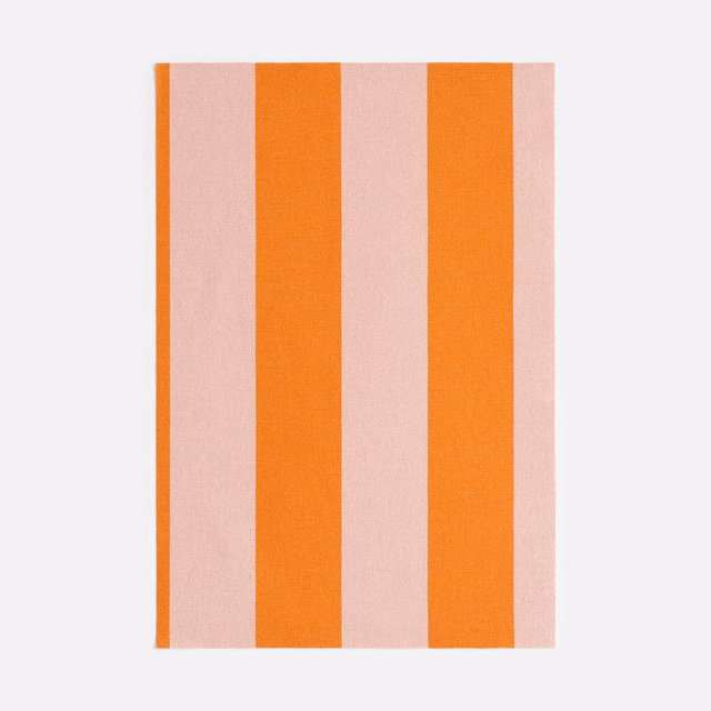 Coral-orange and blush-pink jacquard swatch with broad vertical stripes
