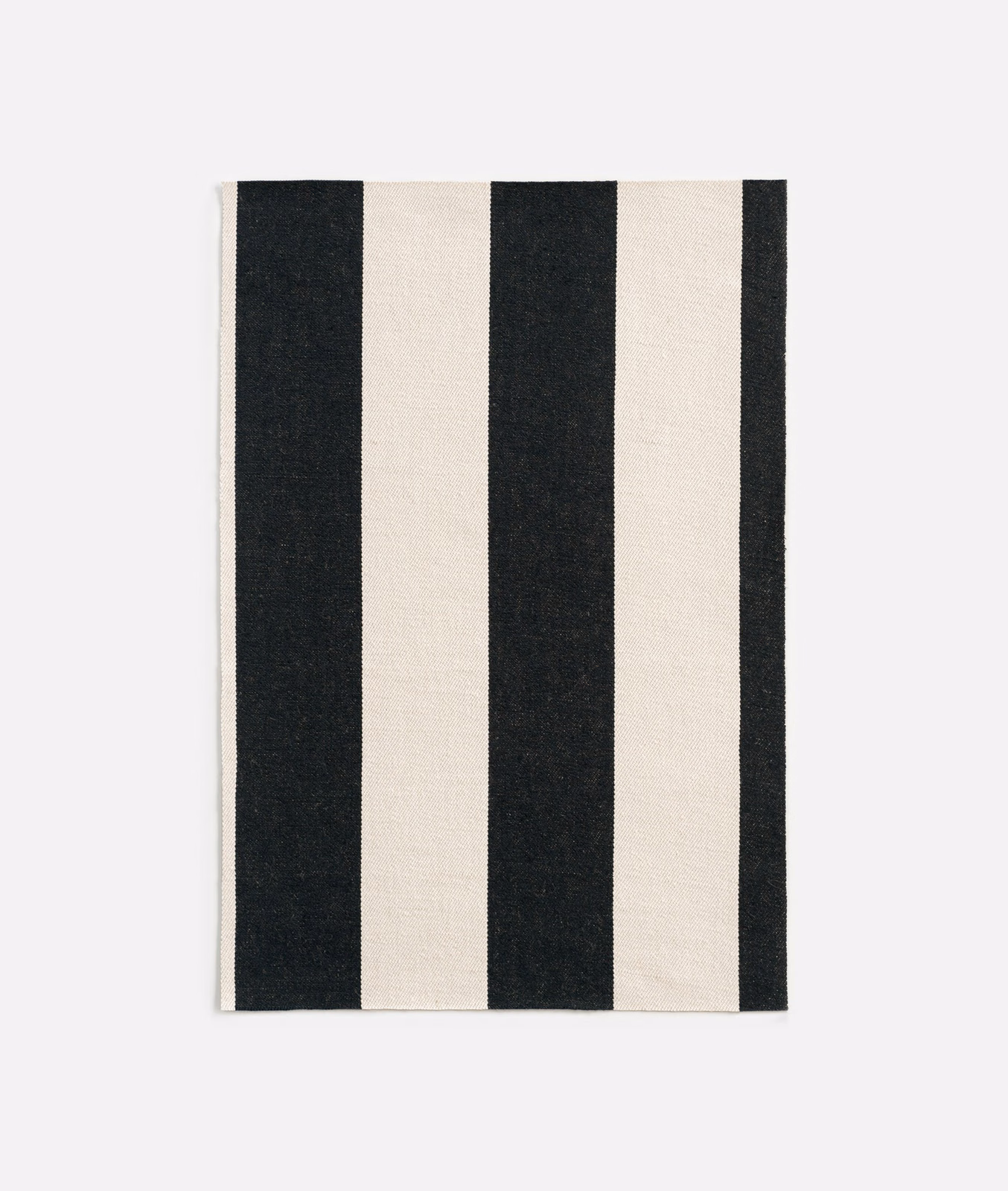 Black and ivory vertical stripe jacquard with a finely textured woven surface