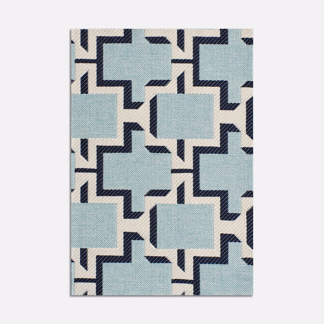 Pale icy blue jacquard with navy stepped blocks, cream accents and fine woven texture