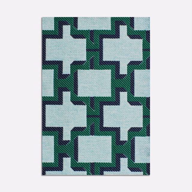 Pale aqua jacquard with navy and green interlocking geometric blocks