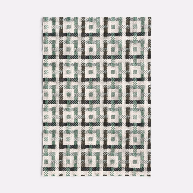 Jade green, cream and charcoal woven jacquard with repeating interlocking square motifs