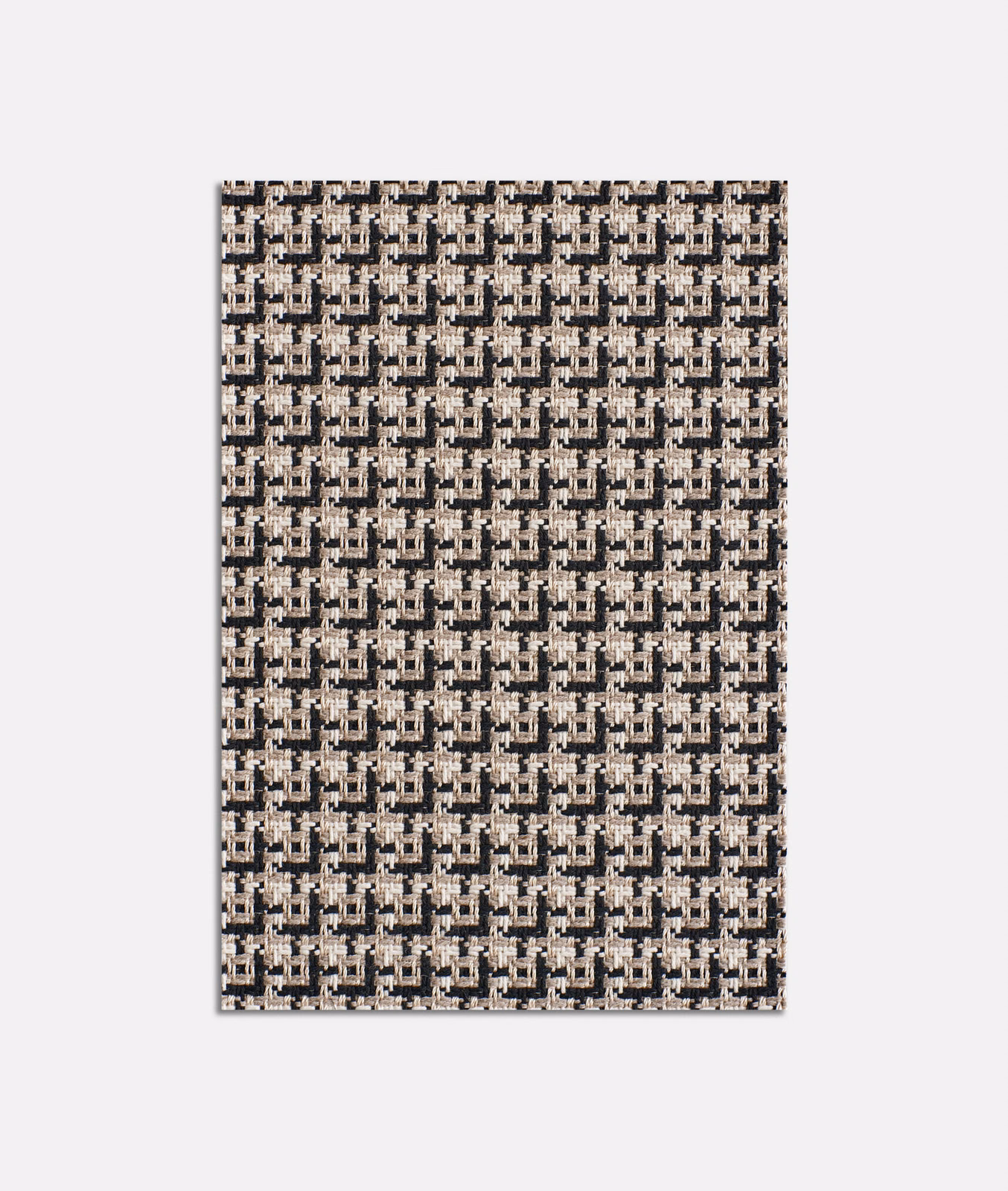 Warm beige jacquard with cream flecks and dense charcoal geometric blocks