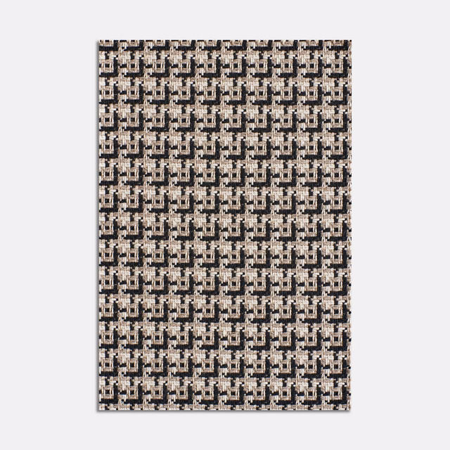 Warm beige jacquard with cream flecks and dense charcoal geometric blocks