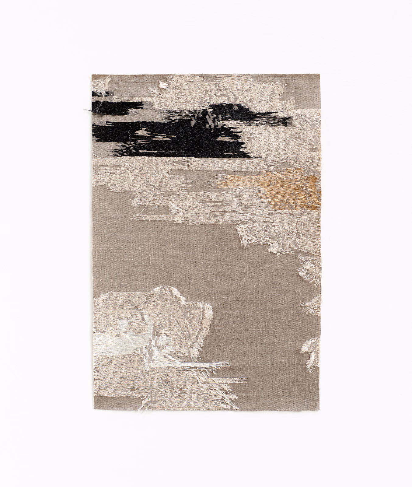 Taupe jacquard swatch with ivory floral brushstrokes, black accents and muted gold