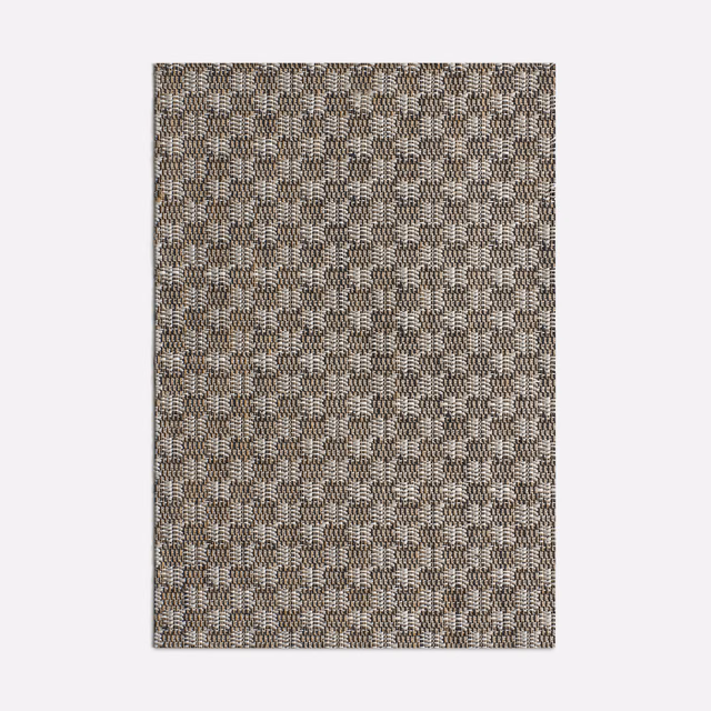 Mottled taupe-brown jacquard with small cream geometric blocks and dense texture