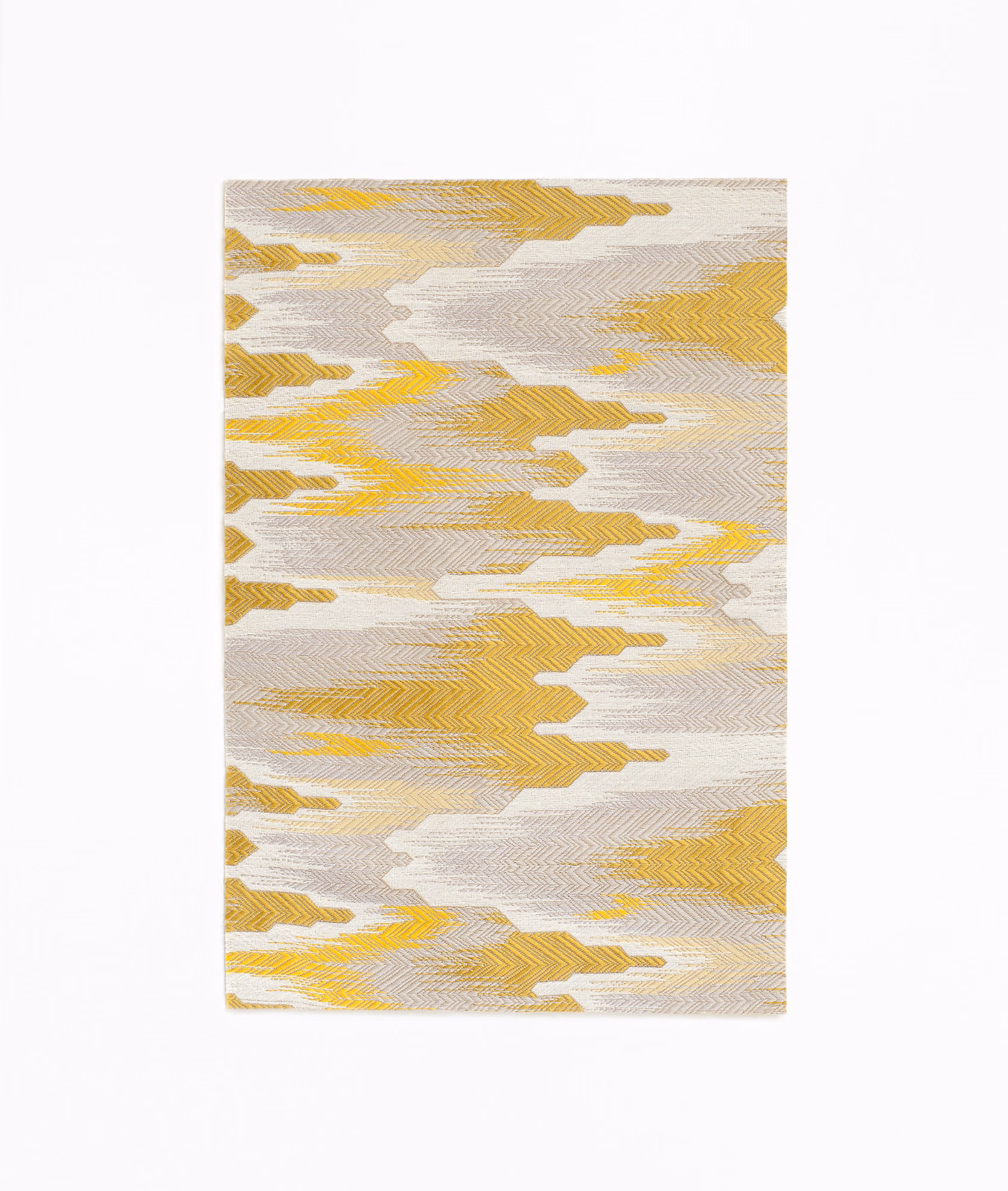 Warm golden chevron bands and ivory-grey woven zigzags in a rectangular swatch