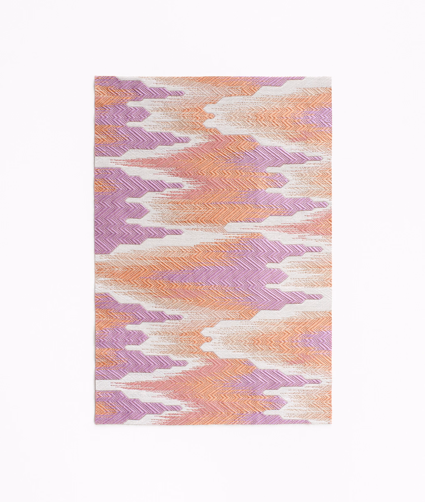 Dusty rose, lilac and peach jacquard with broken horizontal chevron bands