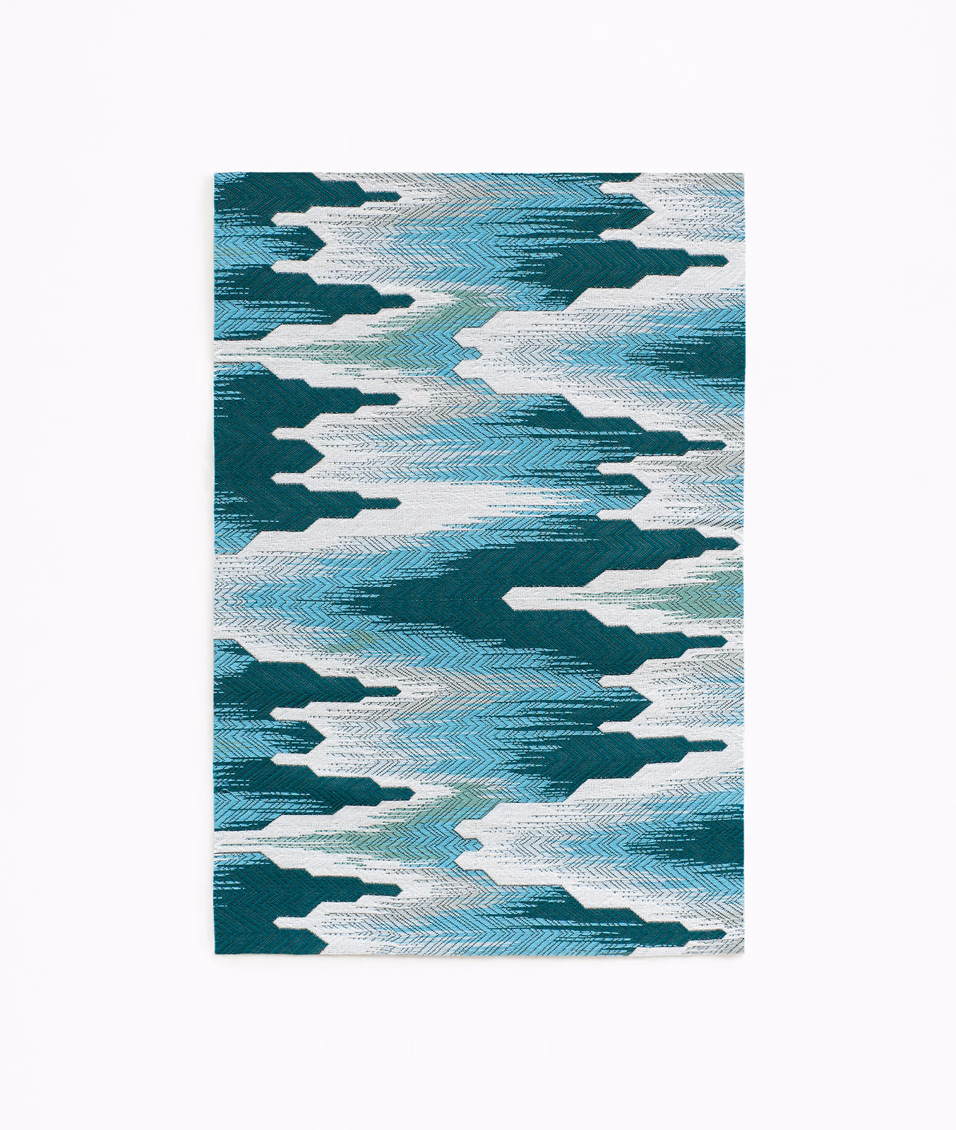 Teal and ivory geometric Navajo-style jacquard weave with layered horizontal bands