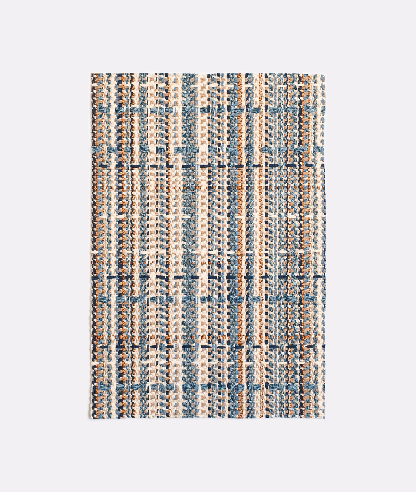 Muted ocean-blue, cream and tan jacquard with irregular vertical woven stripes
