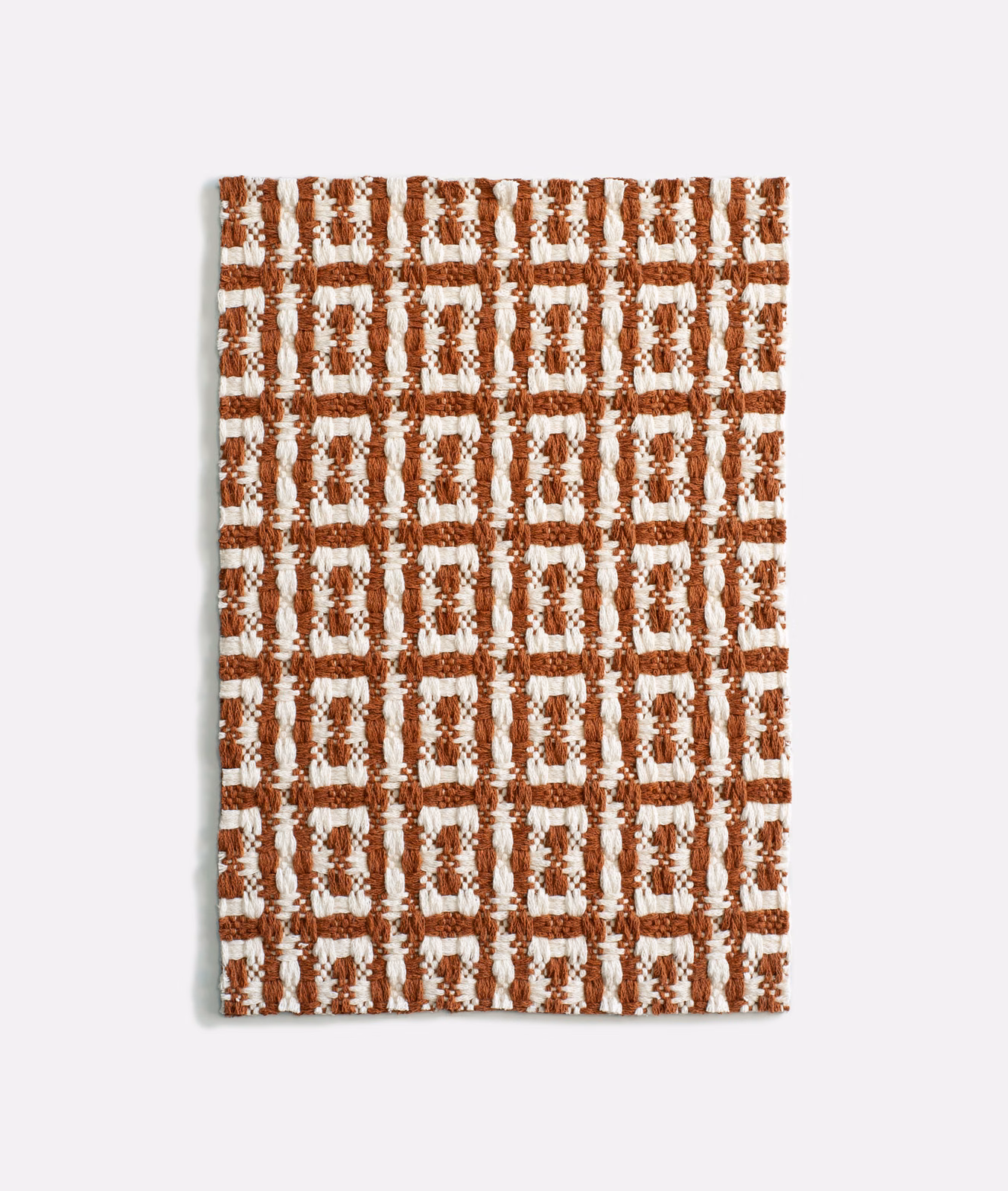 Cuoio brown and ivory jacquard with a tactile rectangular grid weave