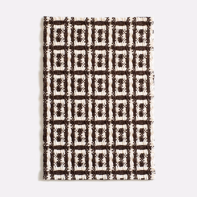 Chunky espresso-brown and ivory jacquard with repeating rectangular grid motifs