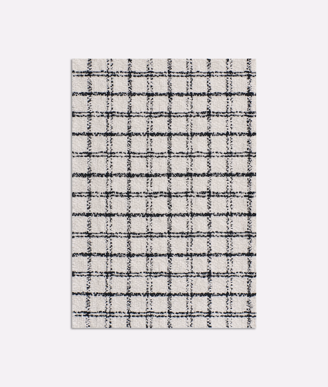 Pale grey jacquard with an irregular charcoal windowpane grid and tactile weave