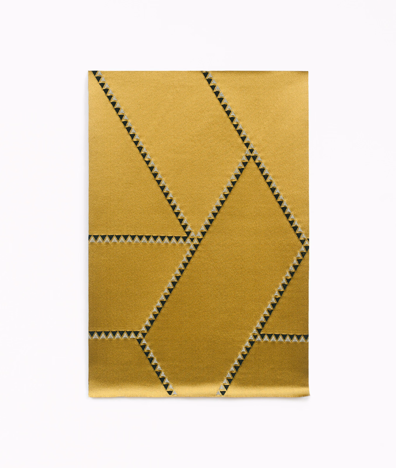 Antique gold jacquard with large angular panels and dark zigzag geometric edging