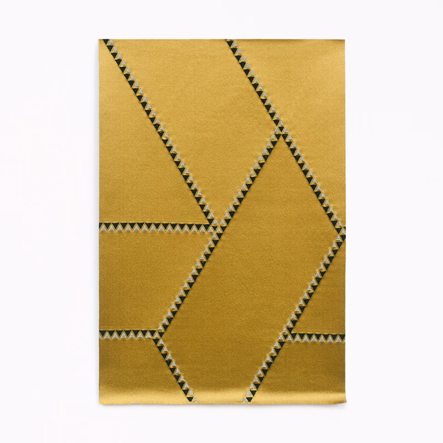 Antique gold jacquard with large angular panels and dark zigzag geometric edging