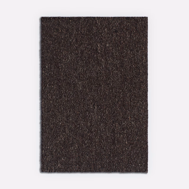 Near-black brown jacquard swatch with a finely flecked, textured woven surface