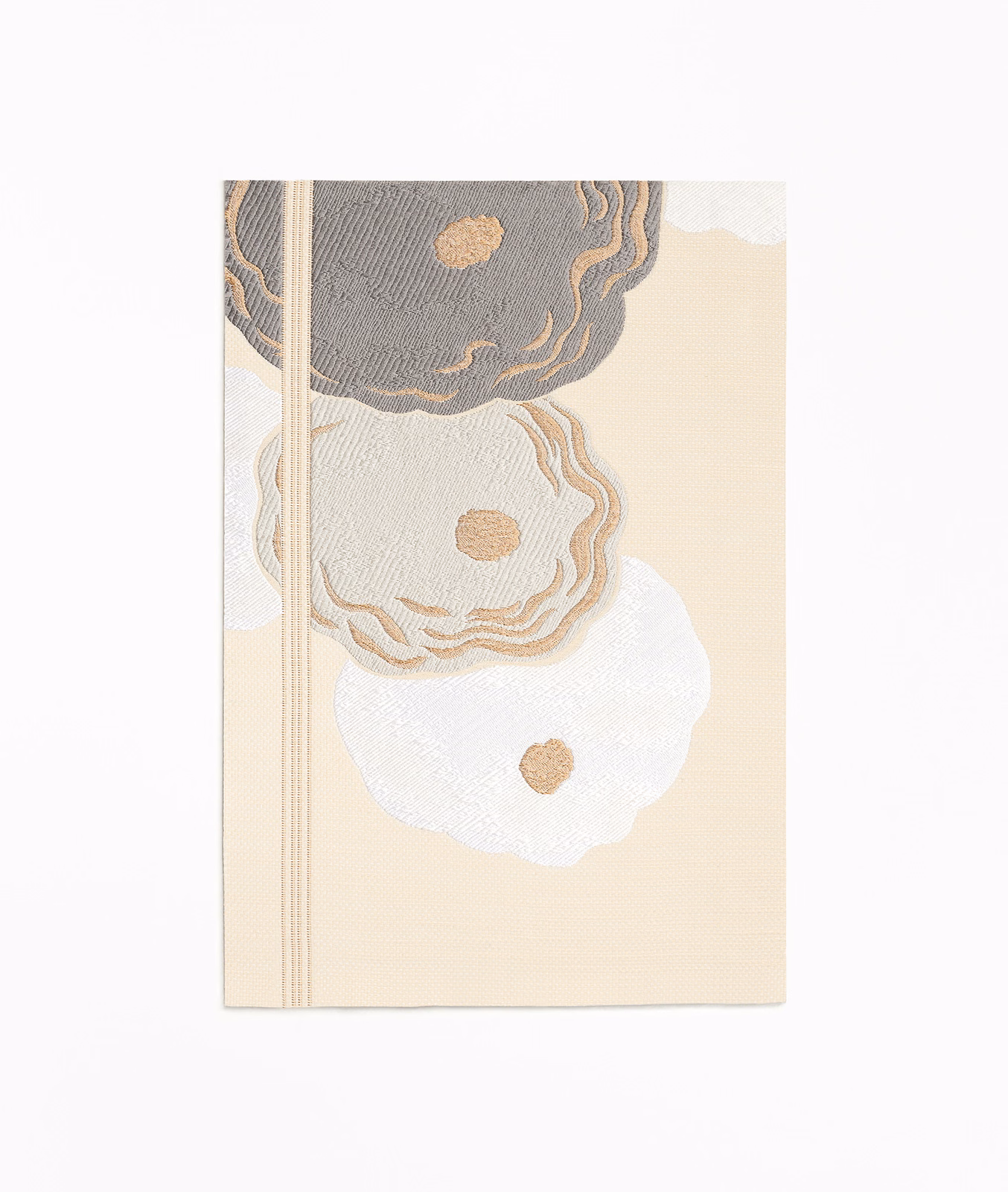 Warm ivory jacquard with charcoal, taupe and white scalloped floral motifs