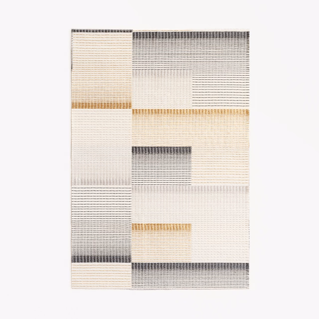 Ivory geometric jacquard with charcoal bands and ochre woven accents