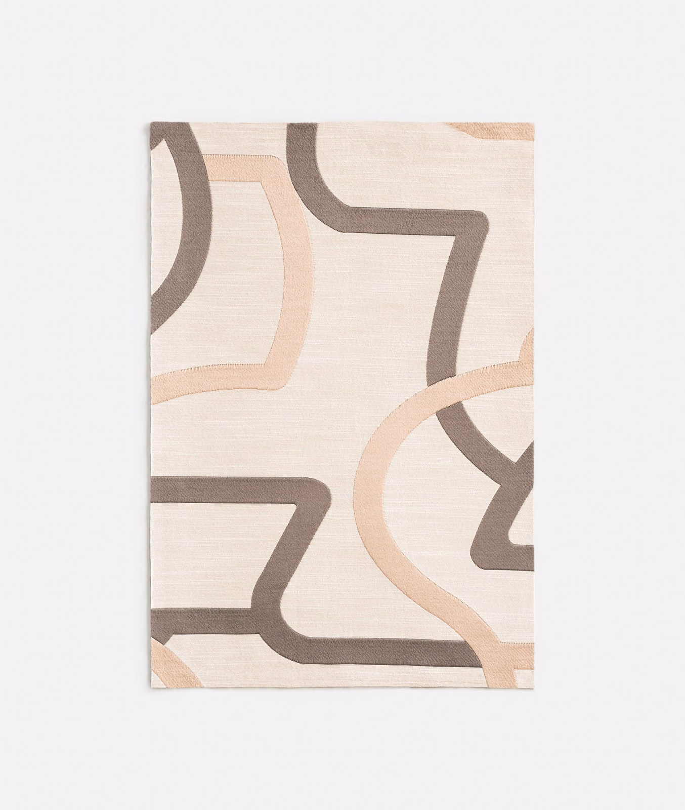 Ivory jacquard with taupe curved bands and pale peach interlocking arcs