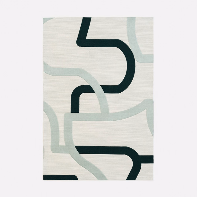 Ivory jacquard with pale sage curves and deep green geometric bands