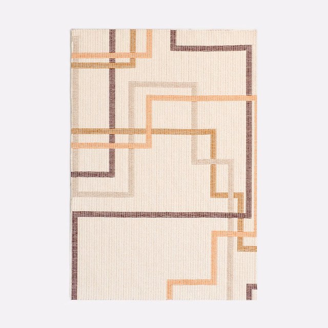 Warm cream jacquard with stepped terracotta, taupe and brown geometric lines