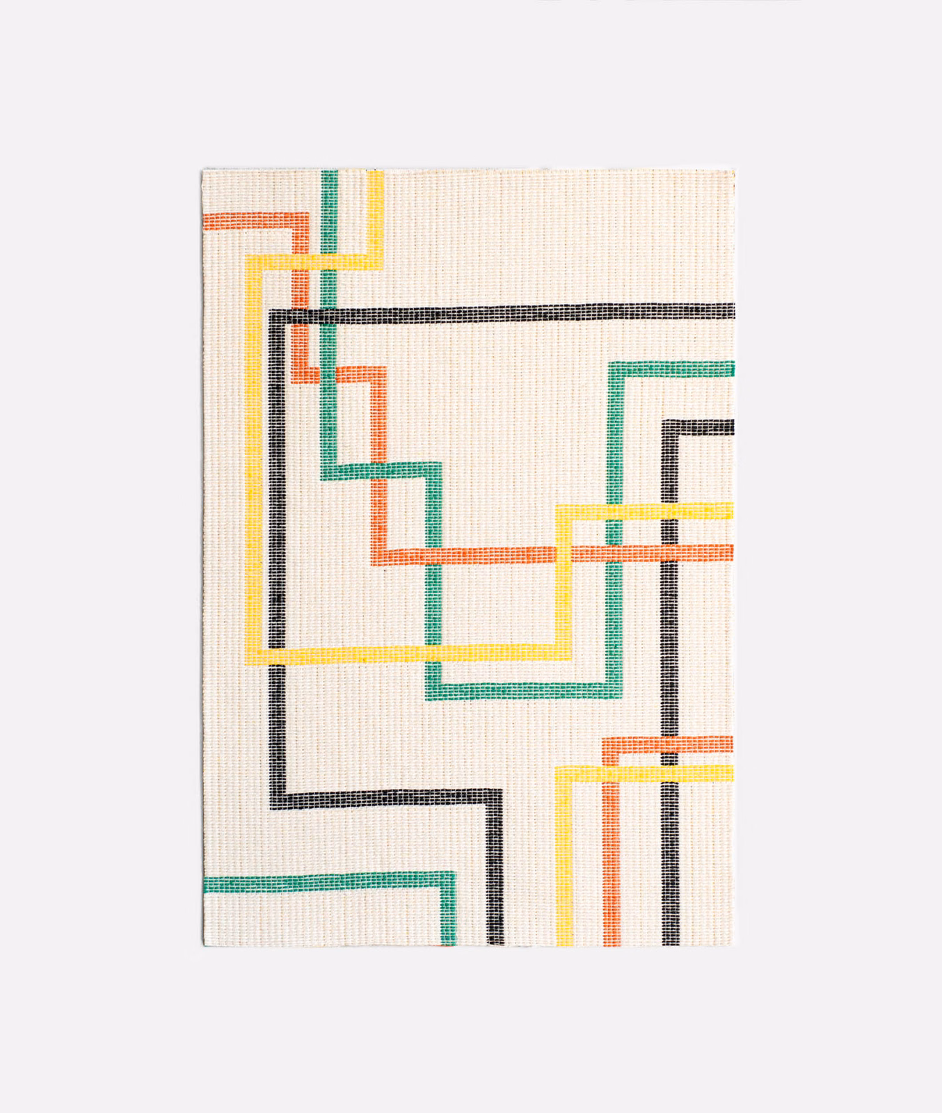 Ivory jacquard with charcoal, teal, coral and yellow interlocking lines