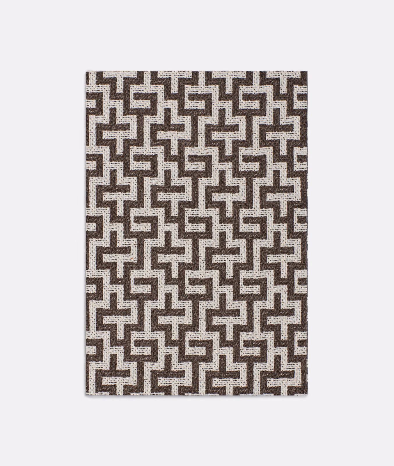 Deep brown and ivory interlocking maze jacquard with a fine tactile weave