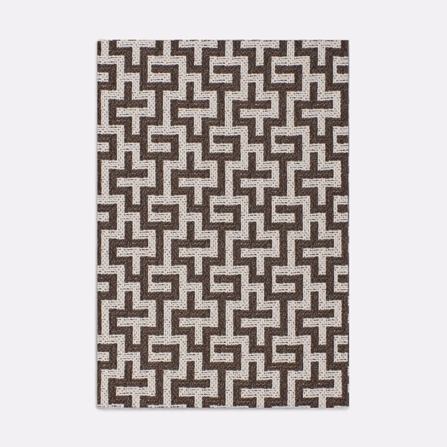 Deep brown and ivory interlocking maze jacquard with a fine tactile weave