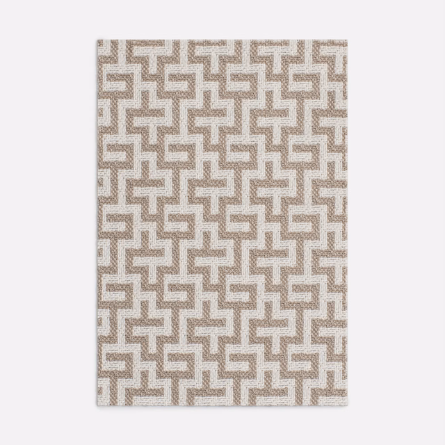 Warm taupe and cream interlocking geometric jacquard with a tactile woven texture