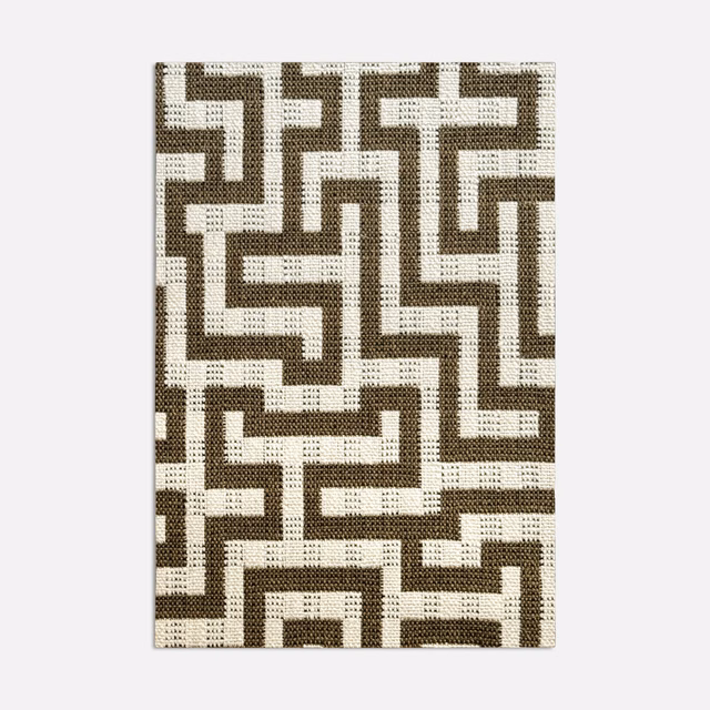 Muted khaki and ivory jacquard with a textured interlocking maze motif