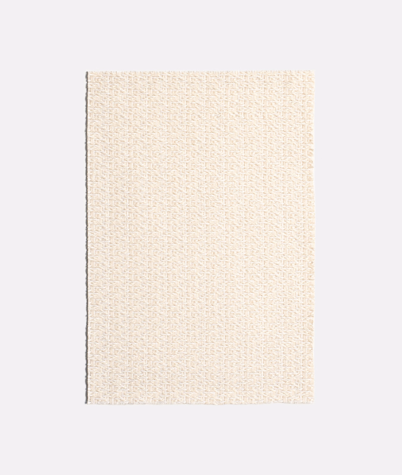 Warm ivory jacquard swatch with fine vertical texture and softly flecked woven surface