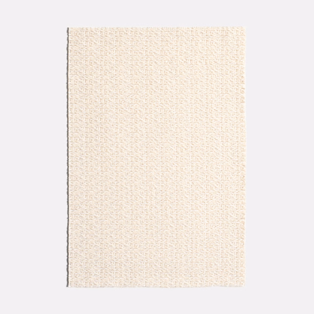 Warm ivory jacquard swatch with fine vertical texture and softly flecked woven surface