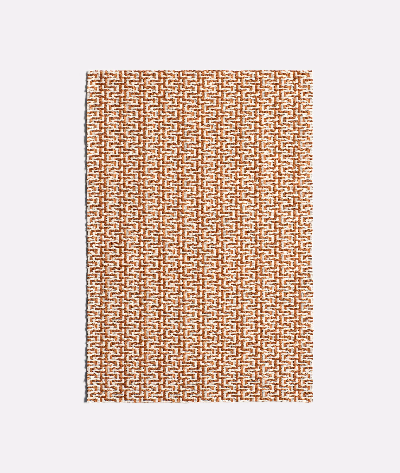 Warm tobacco brown jacquard with a small cream interlocking geometric weave