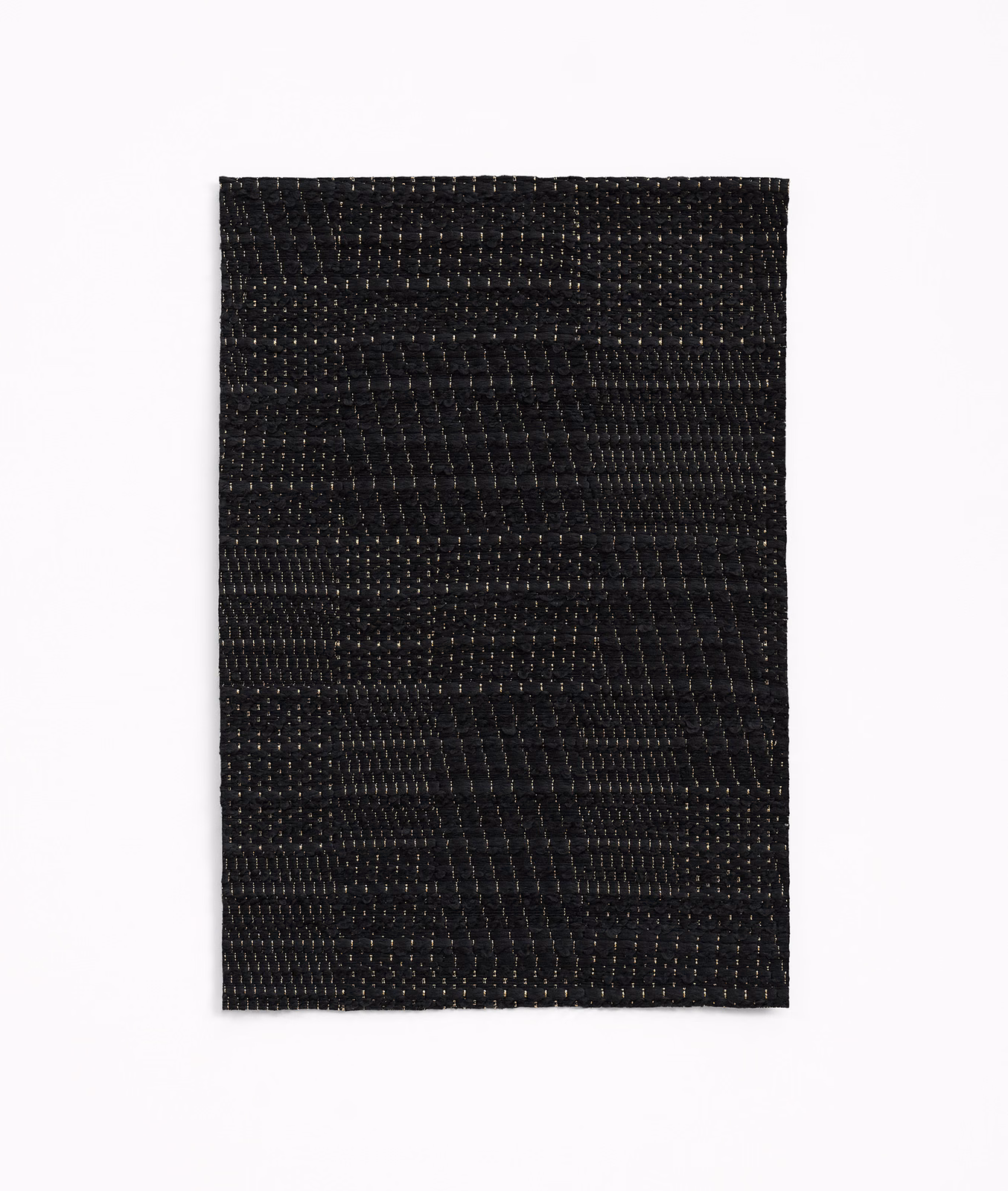 Deep black jacquard swatch with irregular horizontal texture and subtle woven highlights