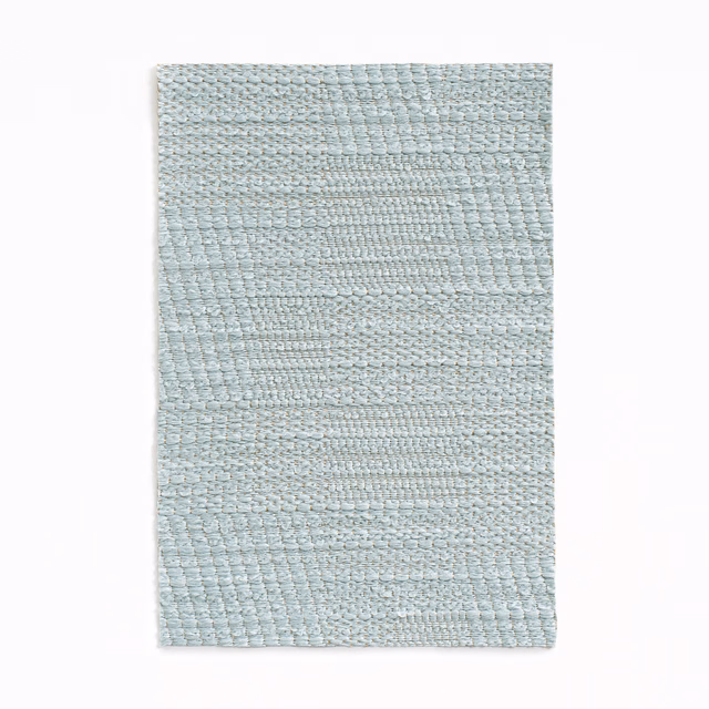 Pale azur blue-grey jacquard with chunky horizontal ridges and tonal patchwork bands